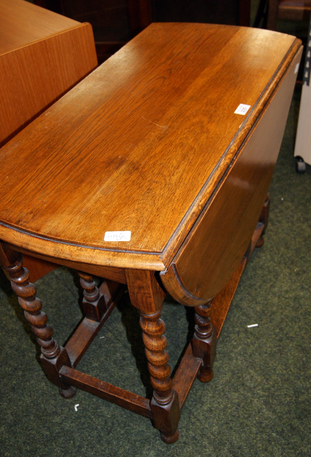 Oak drop-leaf table on barleytwist supports