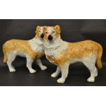 A pair of early Staffordshire dogs, hand-painted and gilt