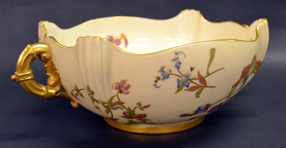 Royal Worcester, a large shaped centre bowl, glazed interior with painted and gilt blush decoration