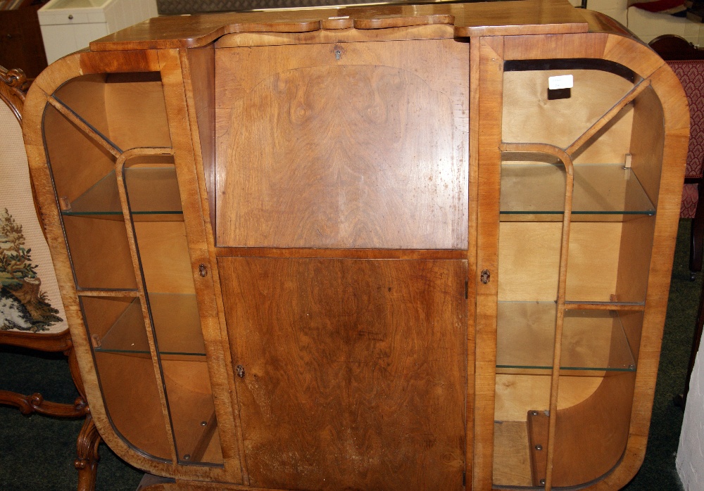 An Art Deco walnut side-by-side bureau display cabinet with fitted interior