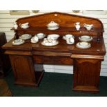 A 19th century mahogany chiffonier of cupboards and drawers with upstand and shelf (A/F)