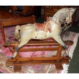 Juvenalia, an early 20th Century carved pine and composite rocking horse, believed to be by F H