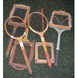 Selection of vintage tennis and badminton rackets, some with storage frames