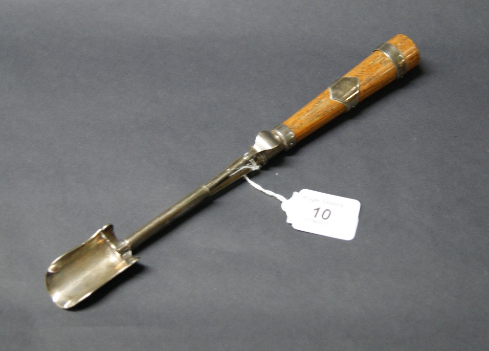 Silver-plated and banded cheese extractor with oak handle