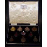 Cased set of silver and bronze sports medals to include medals for Junior Long Jump,