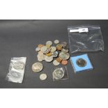 Selection of UK and worldwide coins,