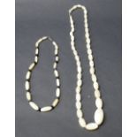 Large mother of pearl necklace plus another