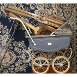 Vintage coach-built Tri-Ang doll's pram along with a good selection of vintage tennis rackets