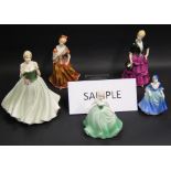 A selection of eight ceramic figurines of ladies in period costume, including Royal Worcester,