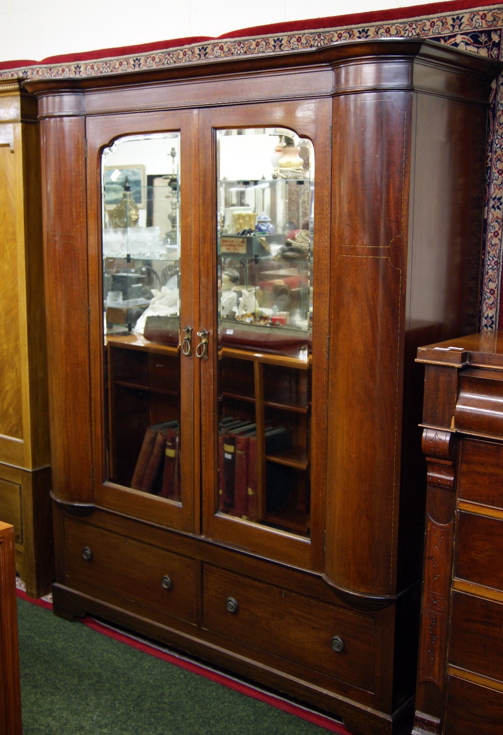 Victorian mahogany two door wardrobe with satinwood inlay, two drawers to the base.