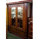 Victorian mahogany two door wardrobe with satinwood inlay, two drawers to the base.