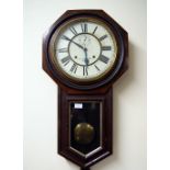 A  large antique wall clock by J Saum,