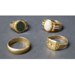 Four gentleman's dress rings, one of the rings set with a bloodstone and another set with diamonds.