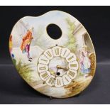 A 19th century french clock, the outer ceramic painted face in the form of an artists palette,