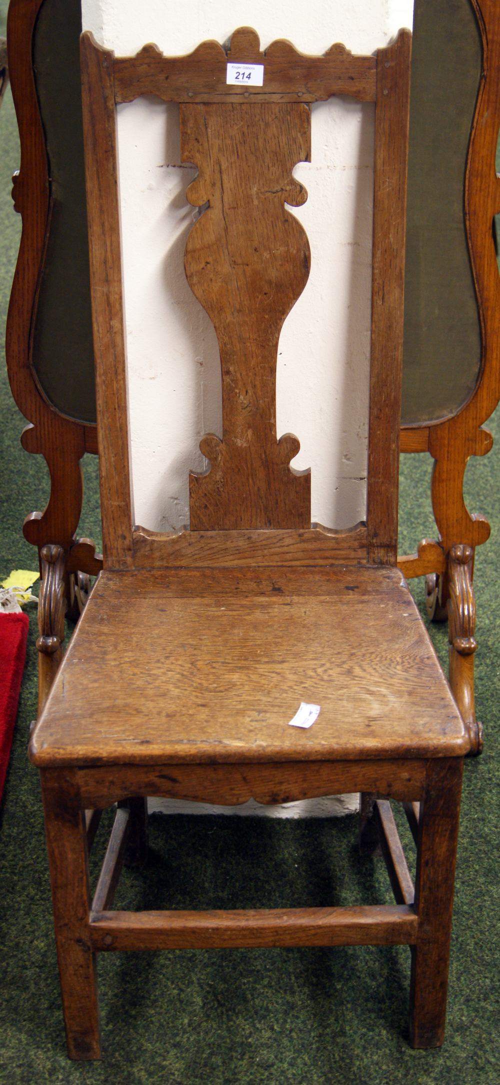 An 18th Century continental oak hall chair