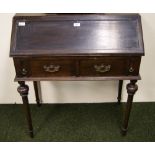 A 19th Century oak fall-front bureau of small proportions