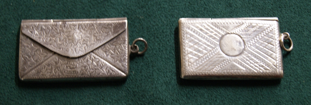 Two silver stamp holders (19g)