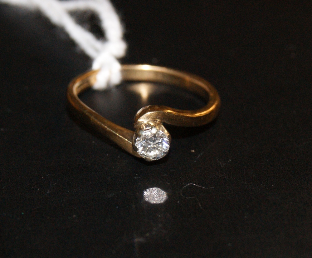 A 9 carat yellow gold ladies' solitaire engagement ring. 0.25 carats.