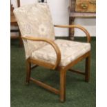 An early 20th Century oak and steamed oak framed salon chair