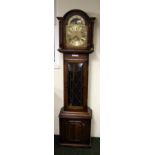 Fenclocks, a modern oak-cased longcase clock with lead-glazed door,