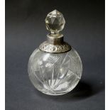 A hallmarked silver-topped perfume bottle,