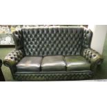 A lounge suite of studded-leather upholstered furniture,