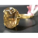 Gold and brown topaz ring on 9ct gold shank