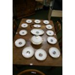 Limoges; a quantity of dinnerware,