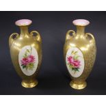 Frederick J Bray for Royal Worcester, a pair of painted and gilt bud vases (one at fault), each