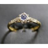 18ct platinum-set sapphire ring with diamond shoulders