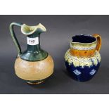 Two Doulton Lambeth-style jugs.