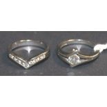 Diamond and platinum set engagement ring and a diamond and platinum set wedding ring to accord.