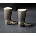 A pair of silver-plated vesta holders in the form of Wellington boots