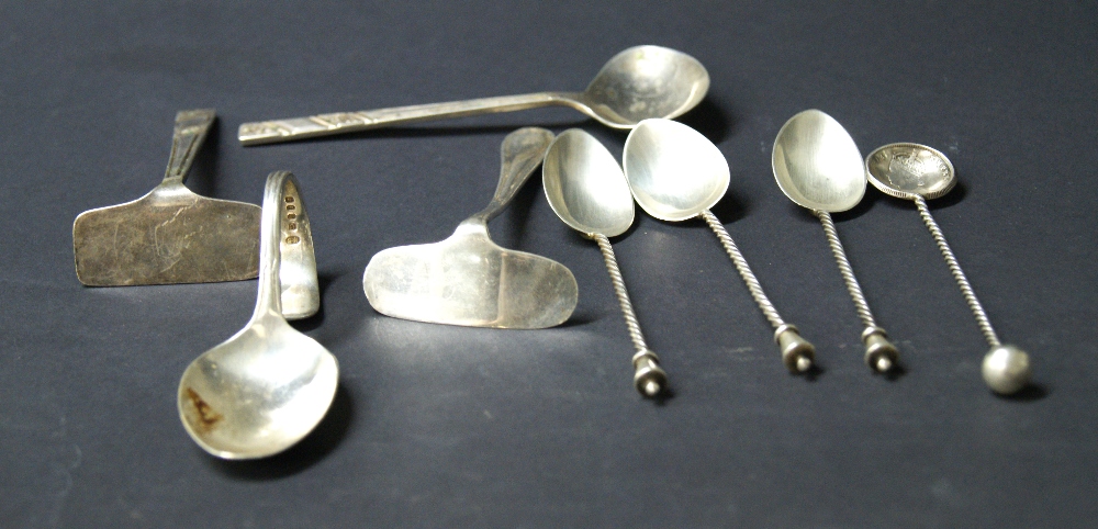 Four hallmarked silver spoons and a silver-plated Christening set