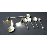 Four hallmarked silver spoons and a silver-plated Christening set