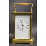 A mid-twentieth century brass-cased chiming carriage clock