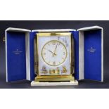 A Swiss gilt-brass and Plexiglass Atmos Marina clock by Jaeger-LeCoutre, Geneva, circa 1960. The