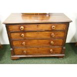 An early 19th century mahogany bachelor's chest,