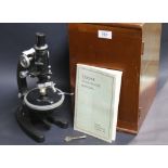 Vintage Cookes oak-cased microscope by Cooke, Troughton and Simms Ltd.