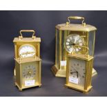 Three carriage clocks and one glass-cased clock