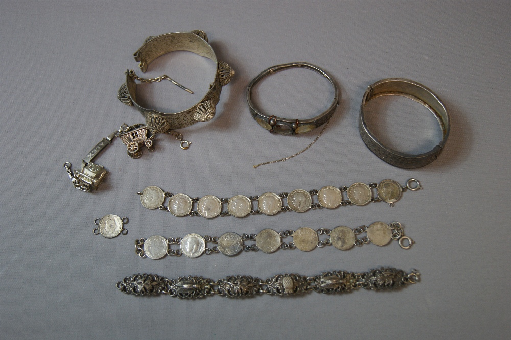 Various silver and white-metal bracelets and bangles