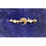 A Victorian 9ct gold bar brooch dated 1897