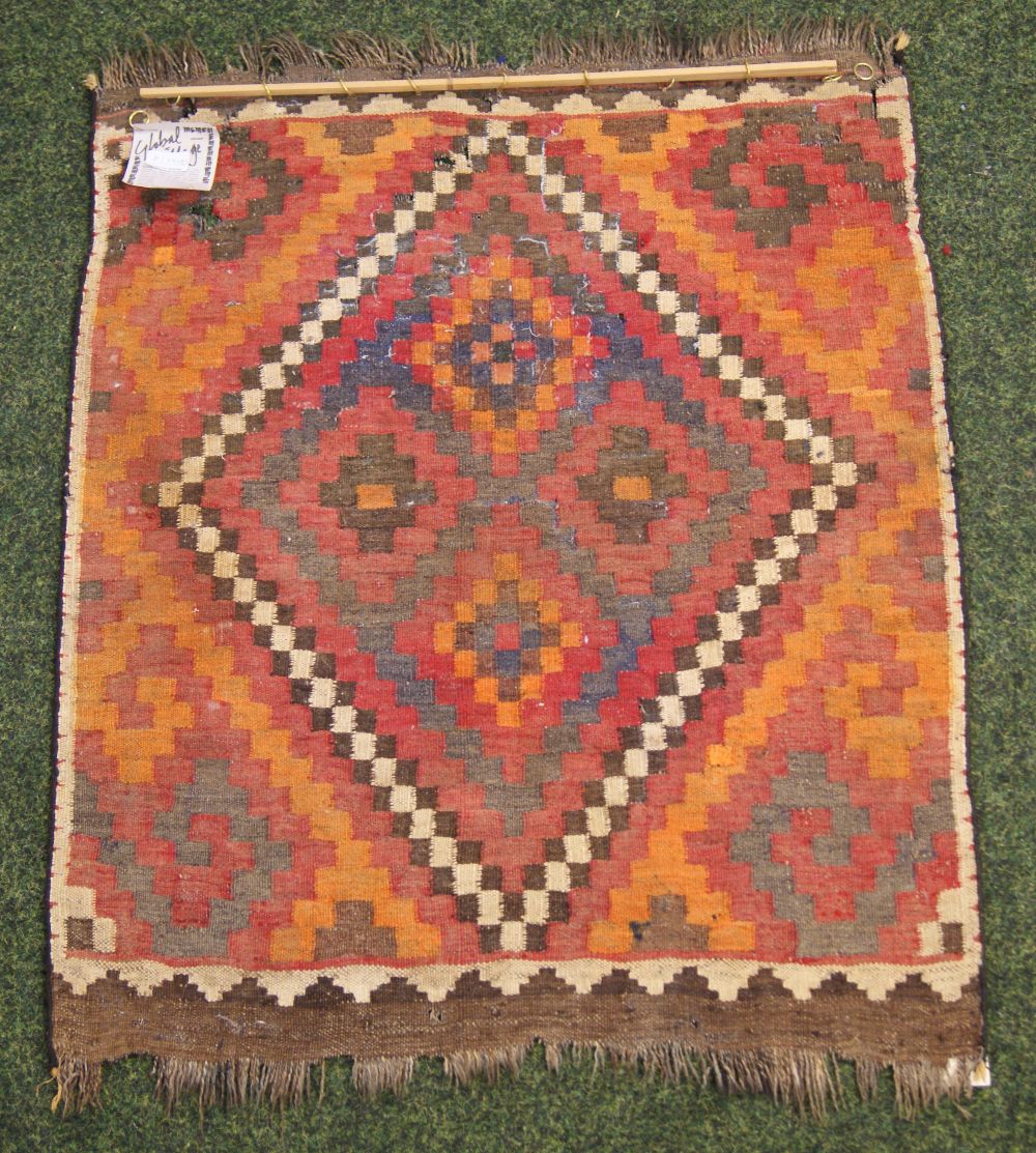 An Asian Kelim rug with geometric designs and fringed to the shorter edges. - Image 3 of 3