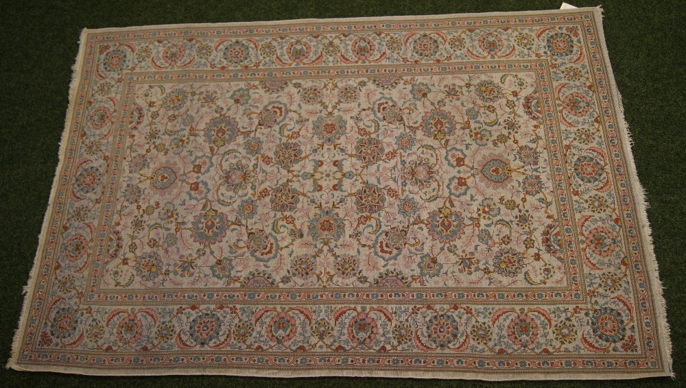 An Iranian floor rug with floral and geometric designs on a predominantly cream ground, - Image 2 of 2