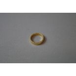 18ct. gold wedding band.  Total weight approximately 4.