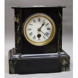 A 19th Century slate and marble cased mantle clock with circular dial and Roman numerals CONDITION