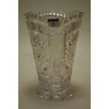 A cut crystal vase of conical form