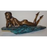 A contemporary bronze and patinated bronze figure of a female nude. Condition Report / Extra