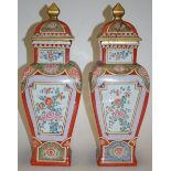 A pair of Limoges porcelain pedestal vas