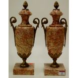 A pair of Italian veined marble pedestal